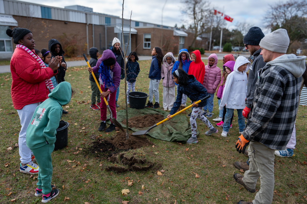 Monsignor Haller Tree Planting Students Working