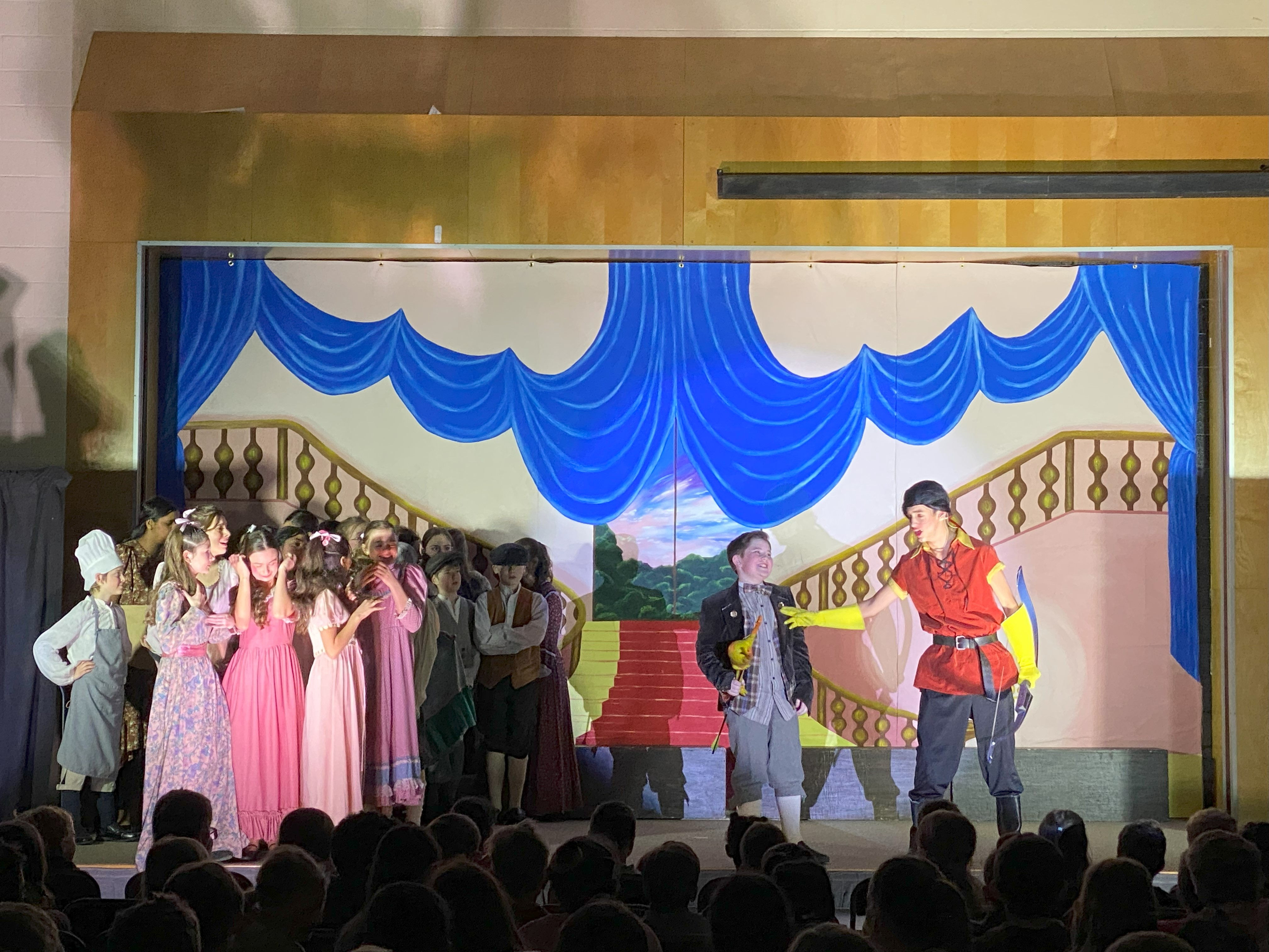 Group of SJPII students acting in the Beauty and the Beast play