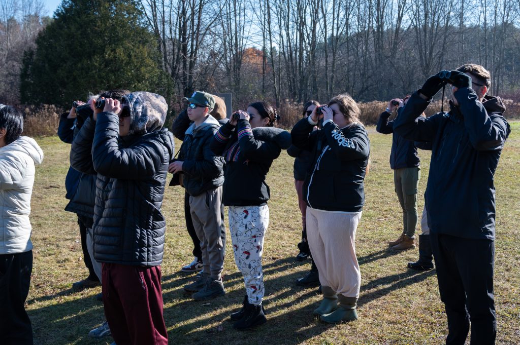 Students with binoculars